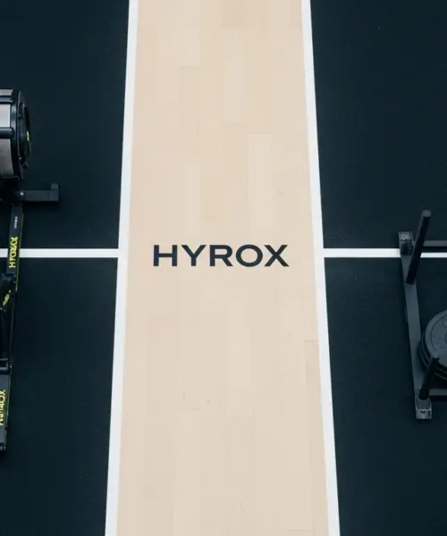 HYROX em Duplas: 3 Benefícios para Iniciantes na Competição do Momento